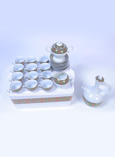 29 - Piece Ethiopian/Eritrean Coffee Set with Box Tilet Edition. The full set  Comes with 12 cups, 12 saucers, a sugar + milk pot ( የቡና ሲኒ እና ረከቦት )