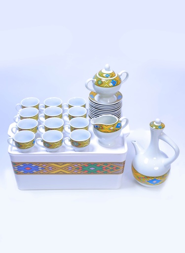 29 - Piece Ethiopian/Eritrean Coffee Set with Box Blue Tilet Edition. The full set  Comes with 12 cups, 12 saucers, a sugar + milk pot ( የቡና ሲኒ እና ረከቦት )